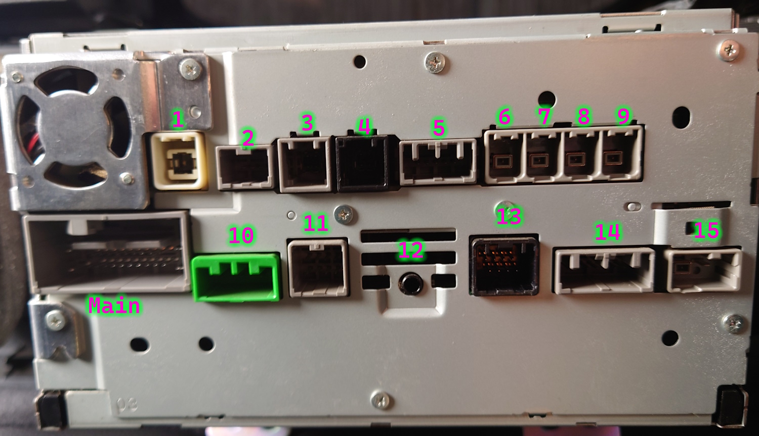 Rear of OEM head unit with connectors labelled